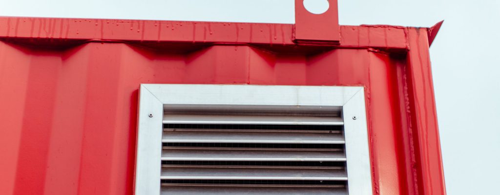Silver Air Vent on Red Shipping Container